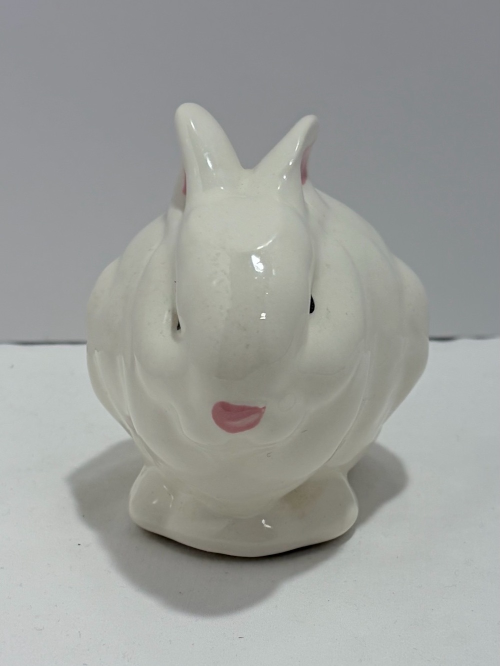 Glossy White Ceramic Bunny Figurine with Pink Ear Detail